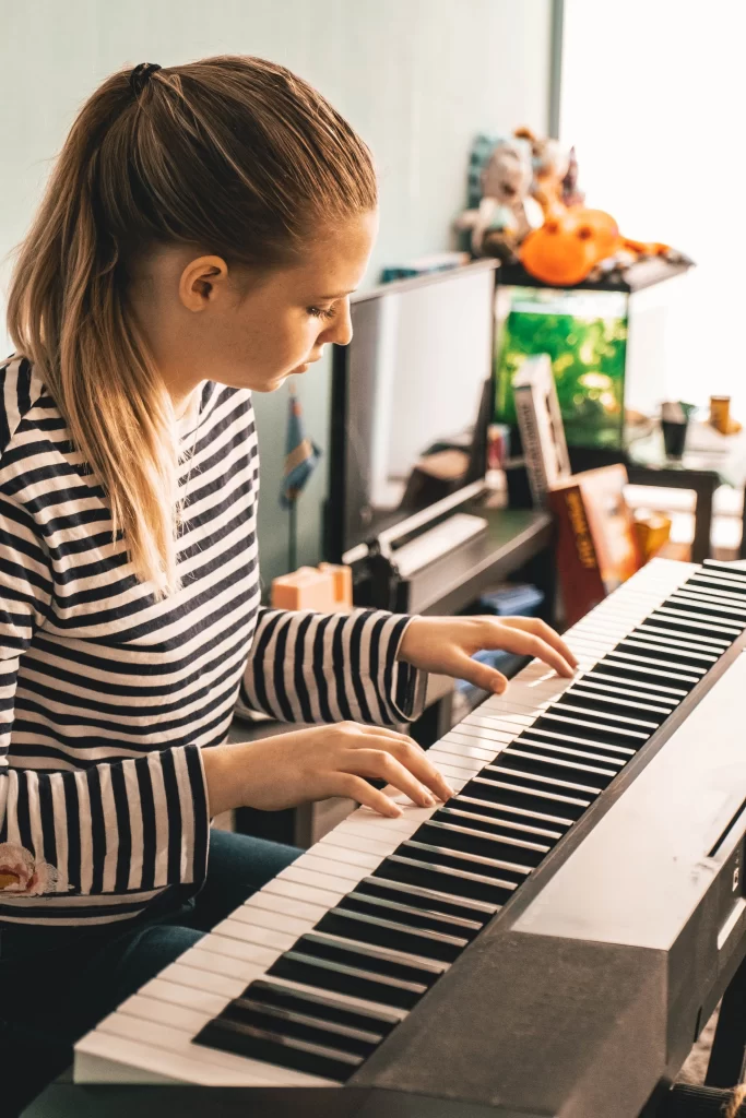 Casually playing the piano to relax