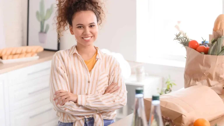 woman happy after decluttering and organizing